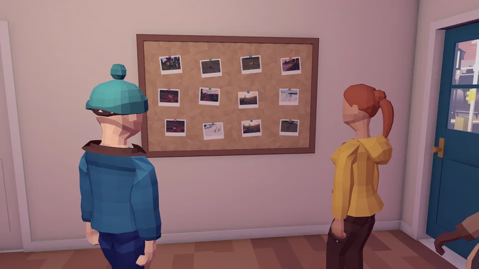 Printed photos pinned on the cork board at home